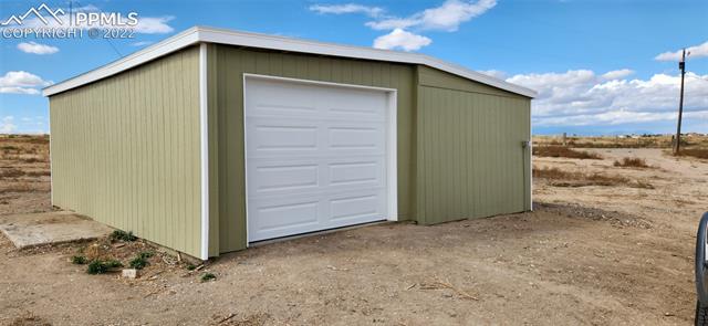 1321 1st Road Pueblo, CO 81007 - Photo 1 of 2 Detached garage with new door and roof