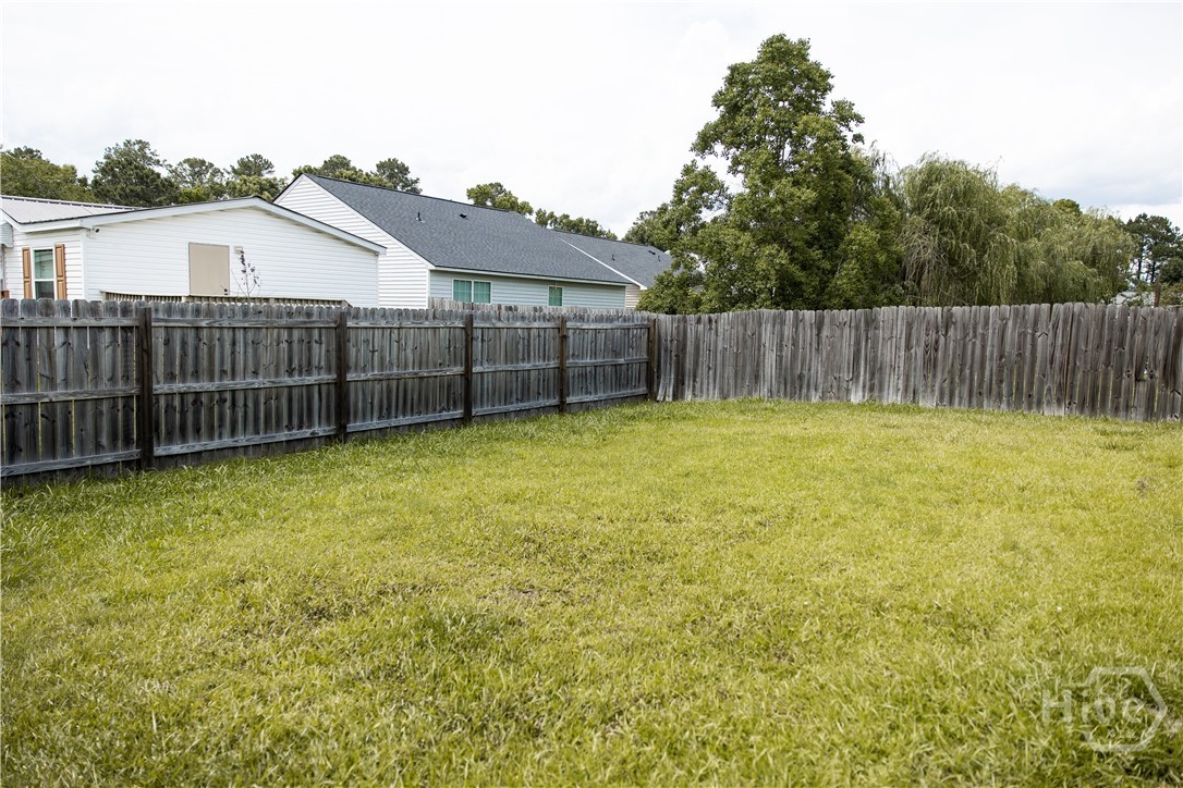 630 Rushing Street Richmond Hill, GA 31324 - Photo 19 of 23 Backyard 1