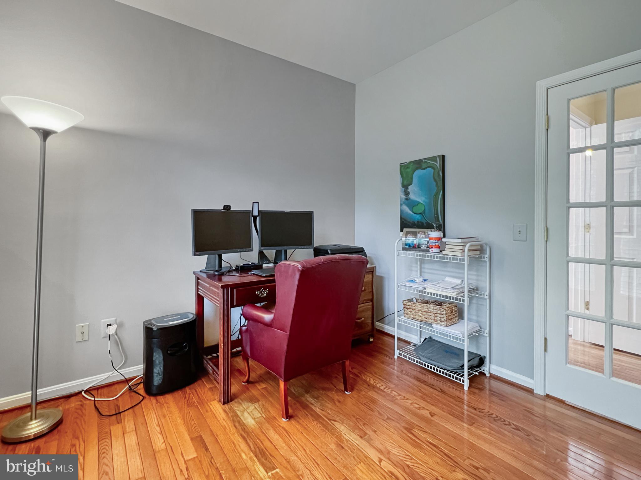 18210 Wickham Road Olney, MD 20832 - Photo 18 of 74 a view of a workspace with furniture and a window