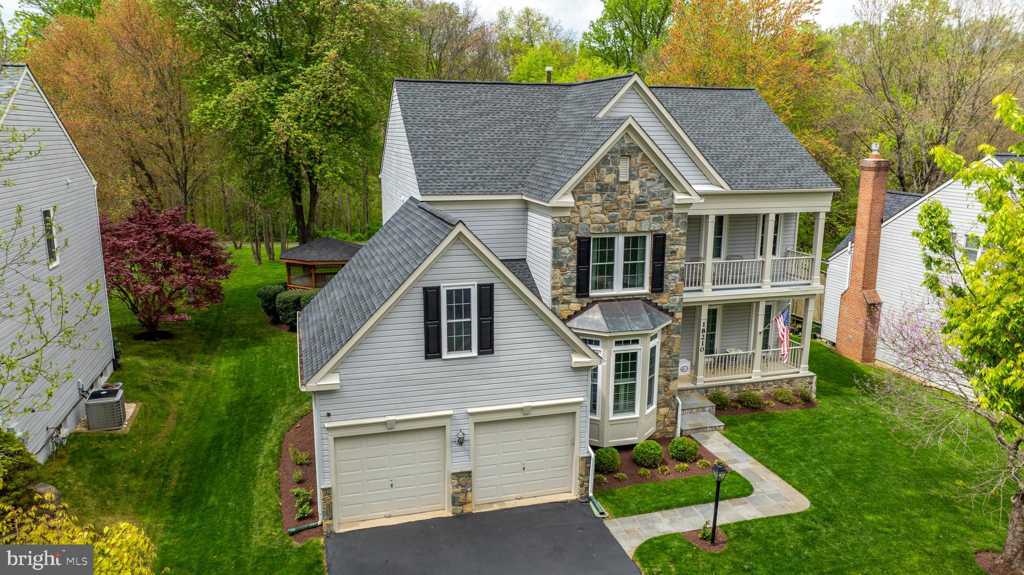 18210 Wickham Road Olney, MD 20832 - Photo 2 of 74 front view of a house with a yard