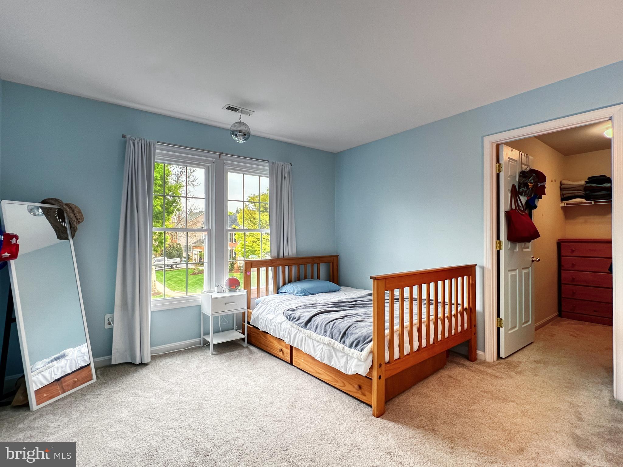 18210 Wickham Road Olney, MD 20832 - Photo 32 of 74 a room with a bed and a window