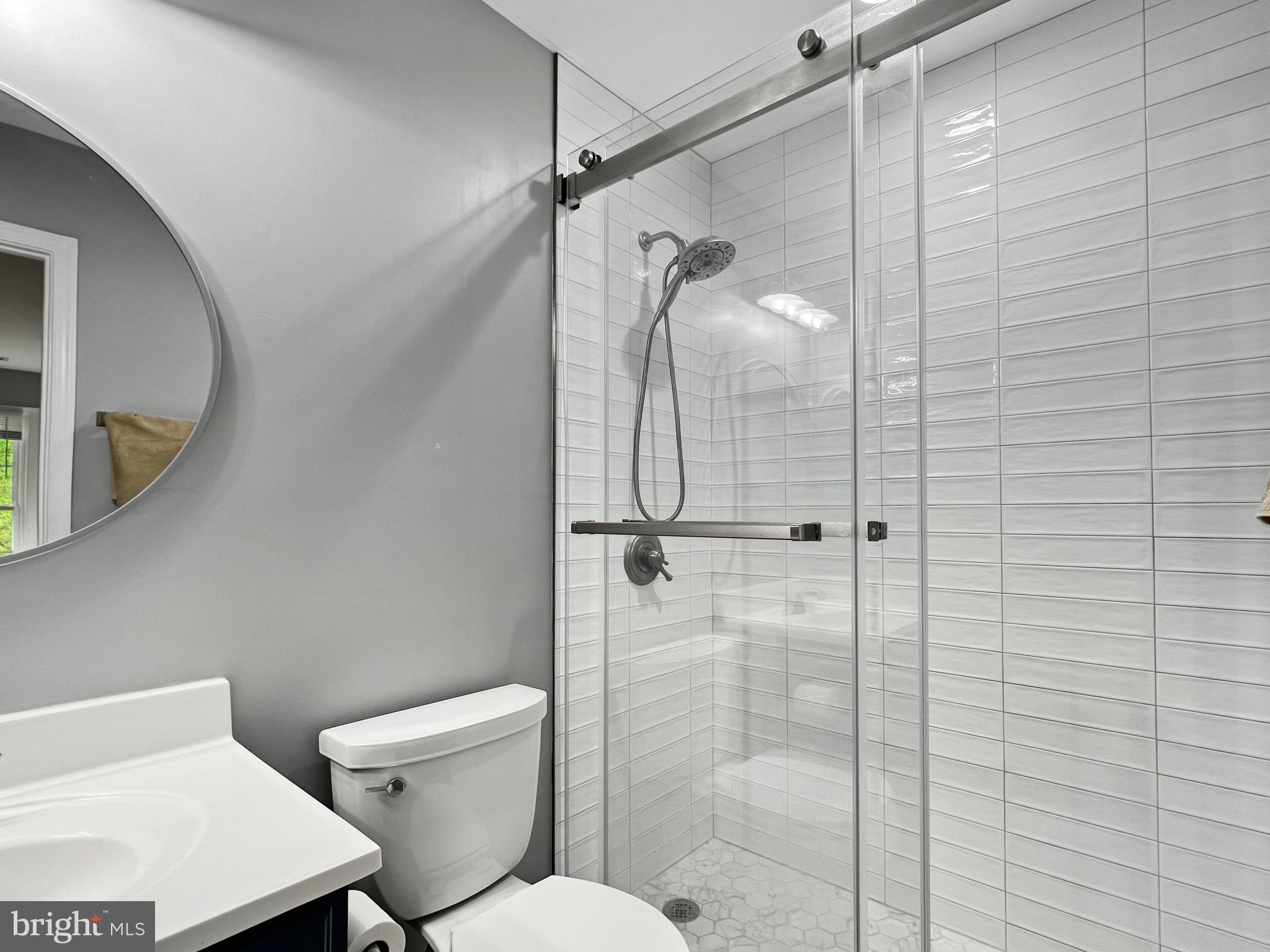 18210 Wickham Road Olney, MD 20832 - Photo 35 of 74 a bathroom with a shower and a toilet