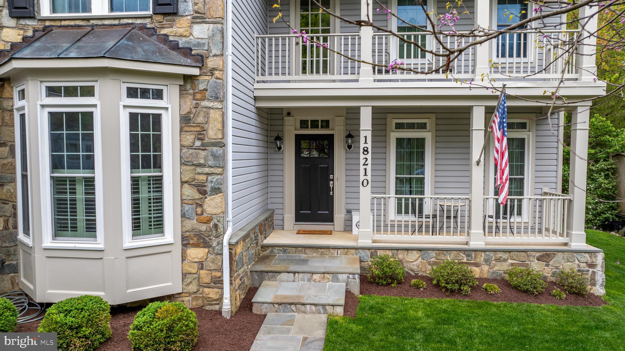 18210 Wickham Road Olney, MD 20832 - Photo 4 of 74 a front view of a house with a garden