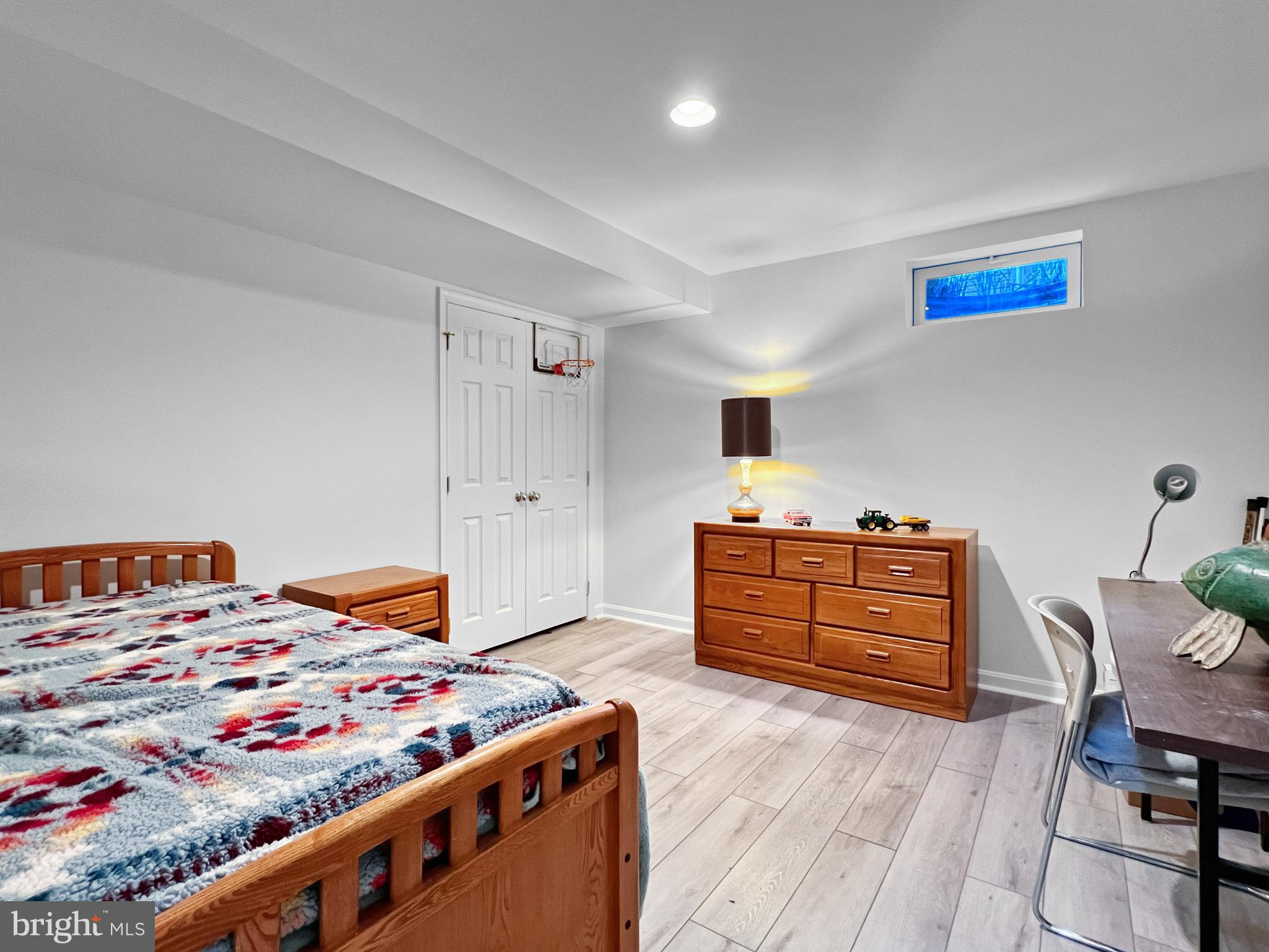 18210 Wickham Road Olney, MD 20832 - Photo 45 of 74 a bedroom with a bed and a dresser in it