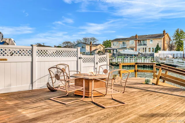 a front view of a house with a fountain