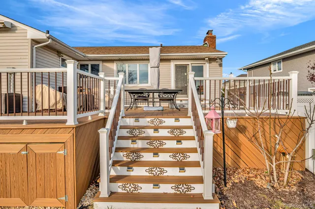 a backyard of a house with seating space