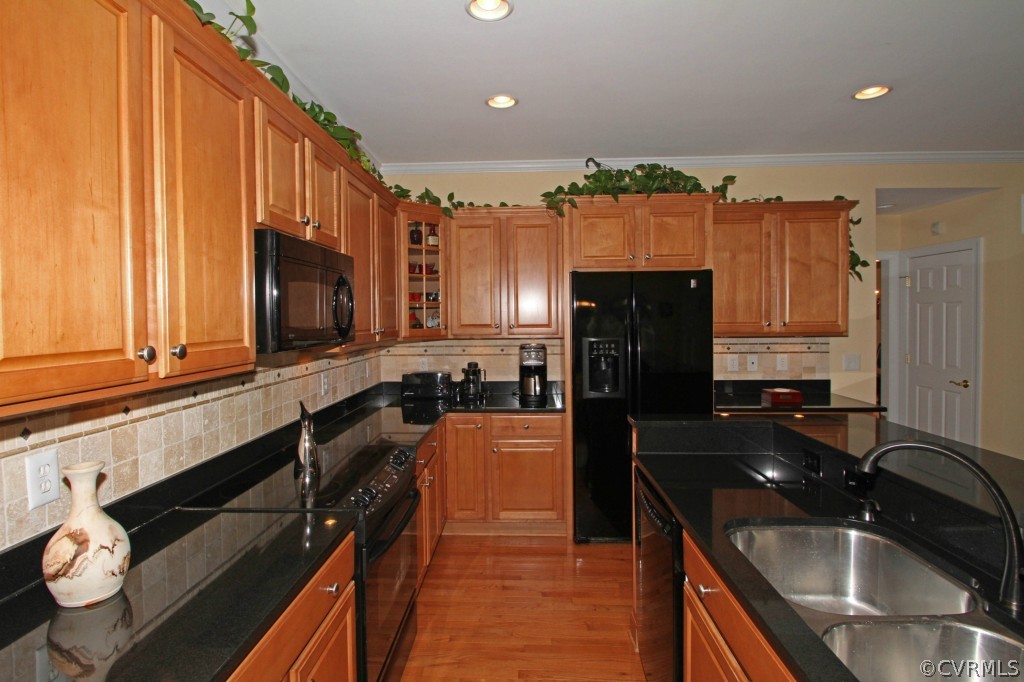13336 Tipple Point Road Midlothian, VA 23114 - Photo 9 of 24 a kitchen with granite countertop a sink stove and refrigerator