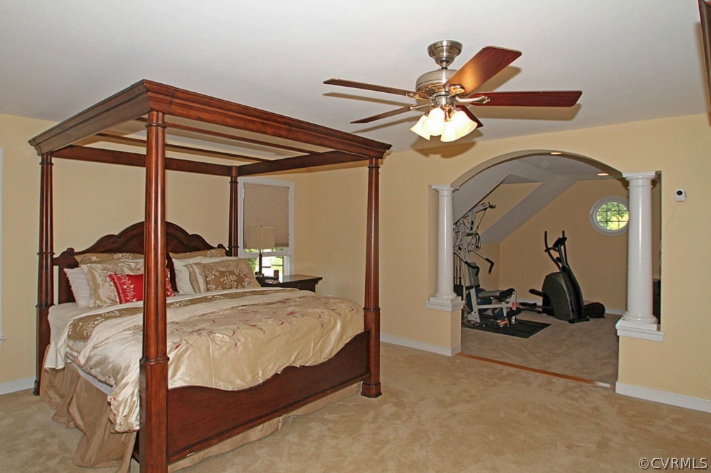 13336 Tipple Point Road Midlothian, VA 23114 - Photo 13 of 24 a bedroom with a bed and a chandelier