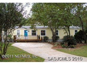 2771 Pellicer Road St. Augustine, FL 32092 - Photo 1 of 22 a view of a house with a patio