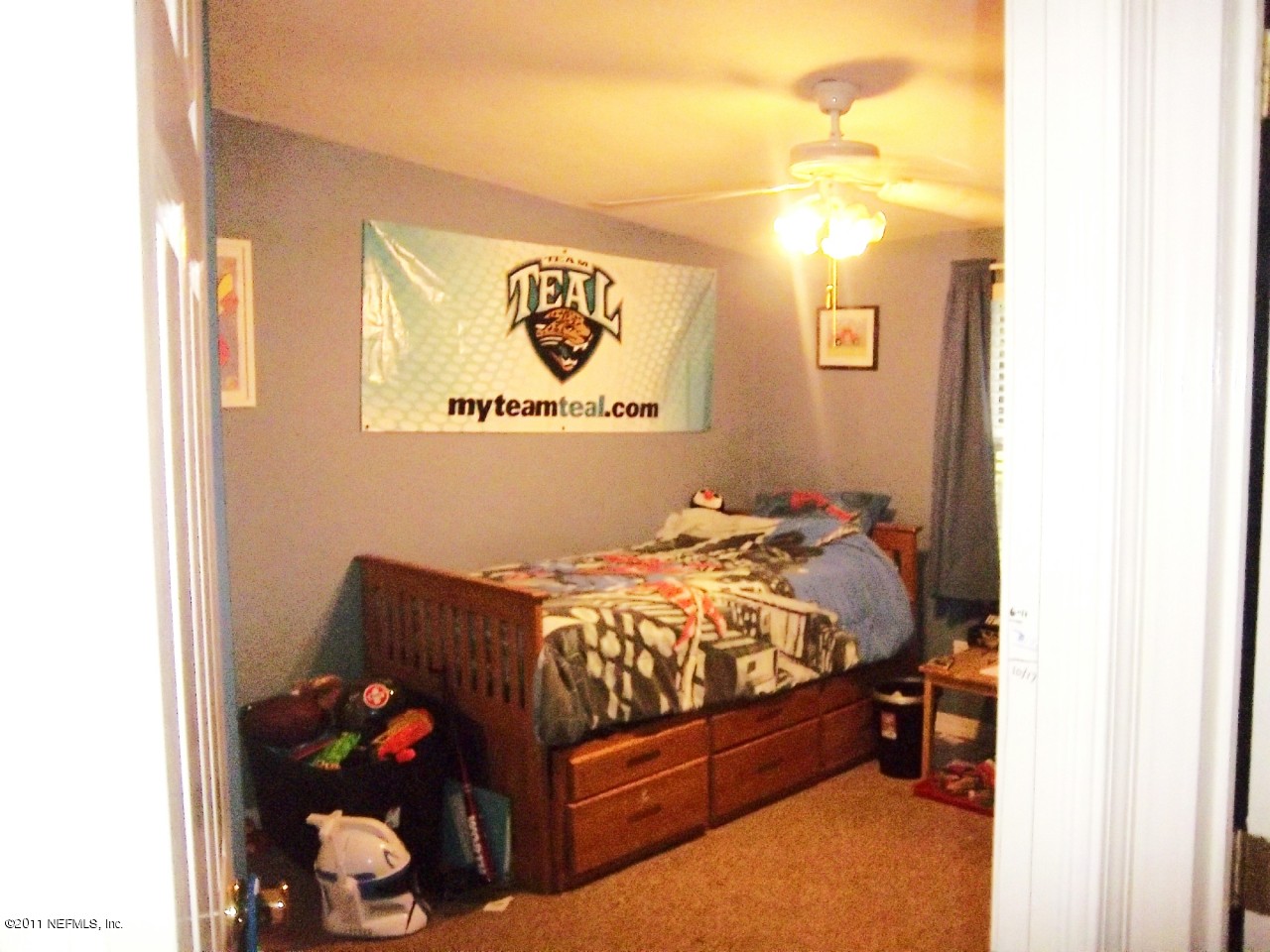 2771 Pellicer Road St. Augustine, FL 32092 - Photo 15 of 22 a bed room with a bed and a couch