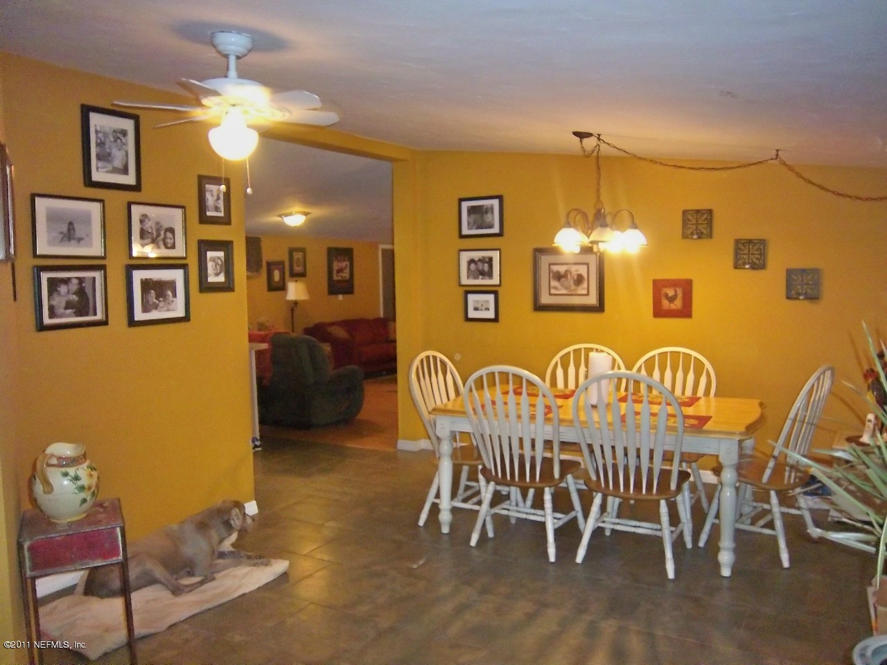 2771 Pellicer Road St. Augustine, FL 32092 - Photo 4 of 22 a view of a dining room with furniture and chandelier