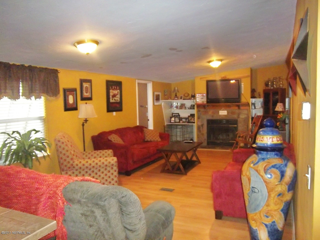 2771 Pellicer Road St. Augustine, FL 32092 - Photo 7 of 22 a living room with furniture and a couch