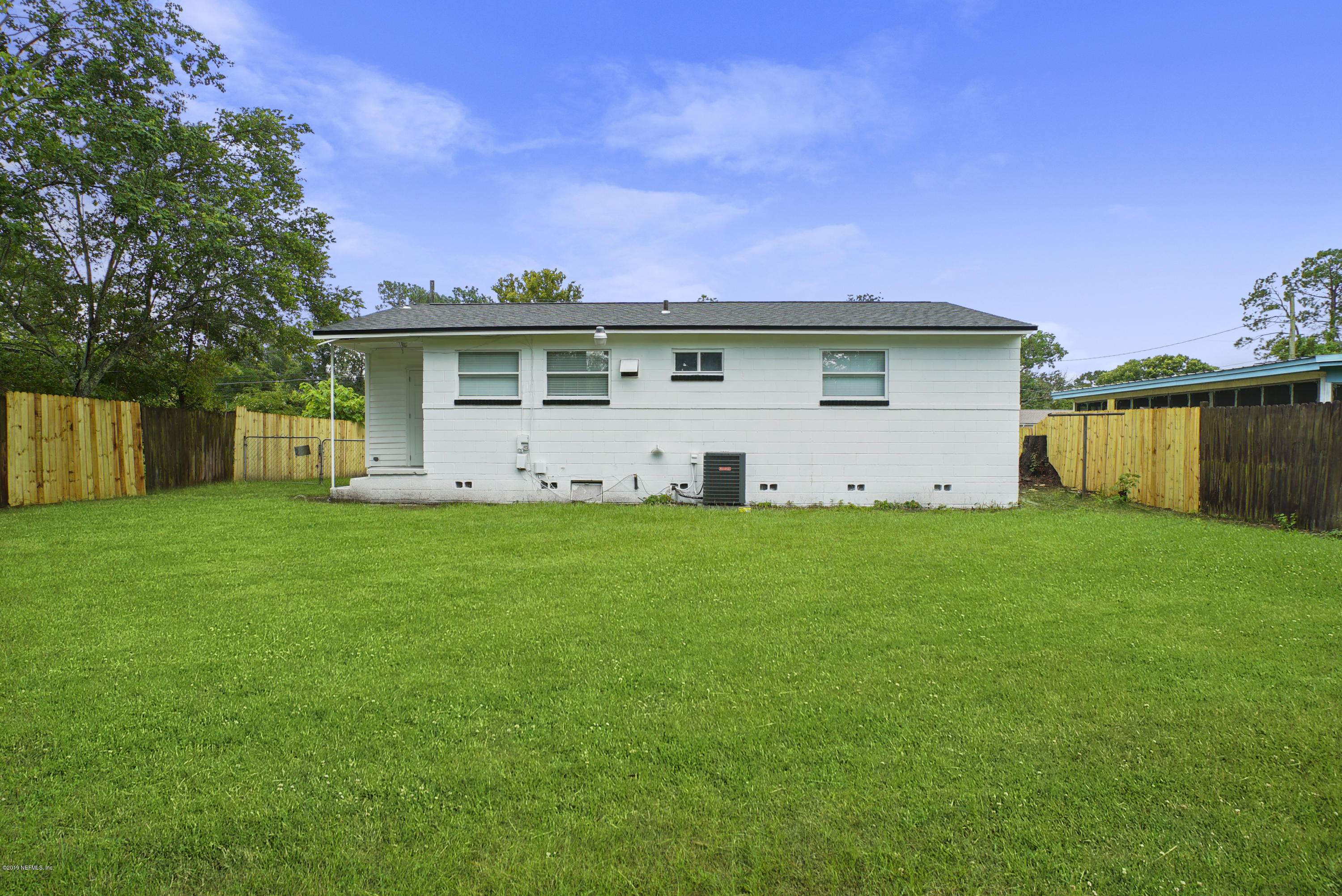10506 Briarcliff Road South Jacksonville, FL 32218 - Photo 14 of 14 a front view of house with yard and green space