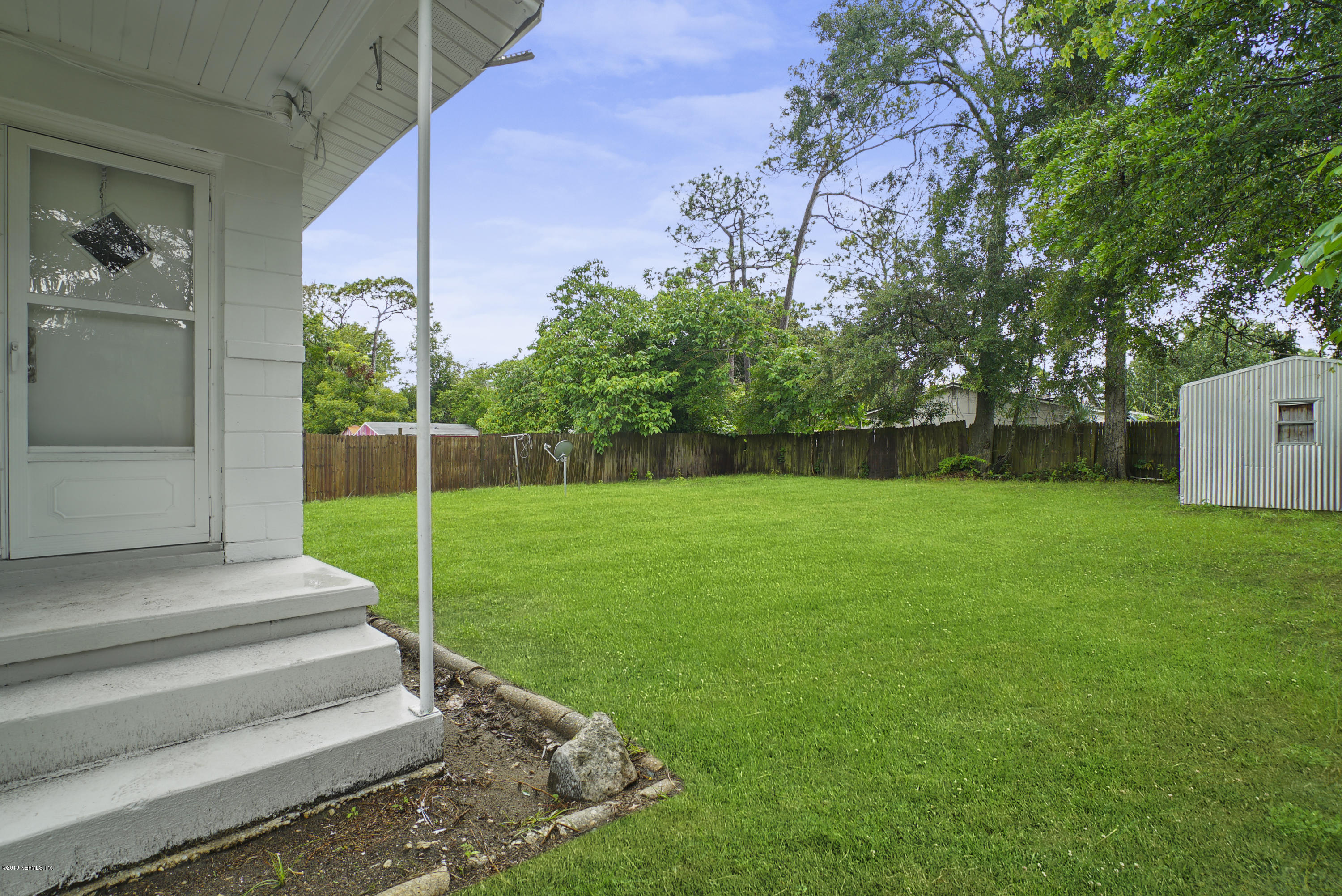 10506 Briarcliff Road South Jacksonville, FL 32218 - Photo 10 of 14 a view of yard with green space