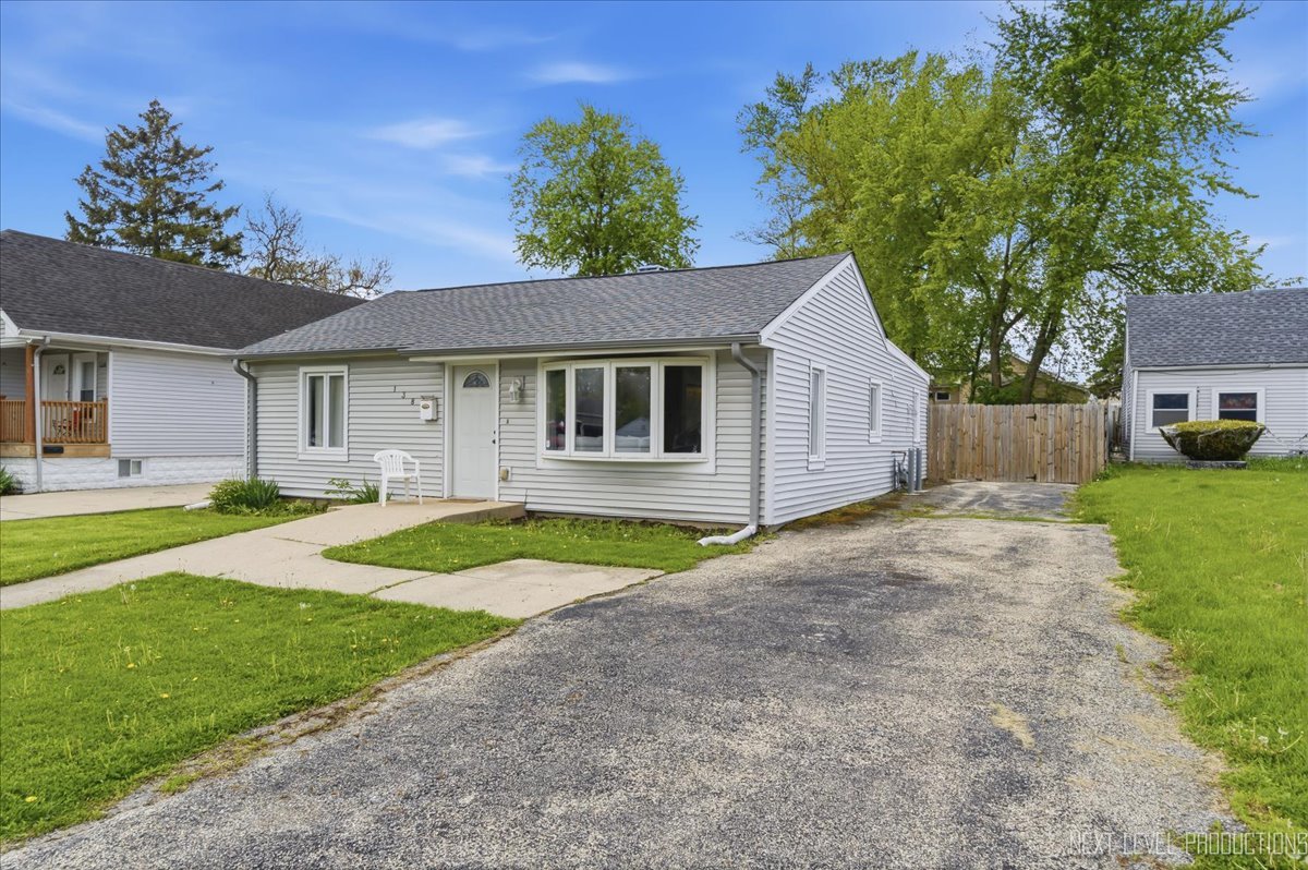 138 North Calhoun Street Aurora, IL 60505 - Photo 2 of 24 a house with outdoor space