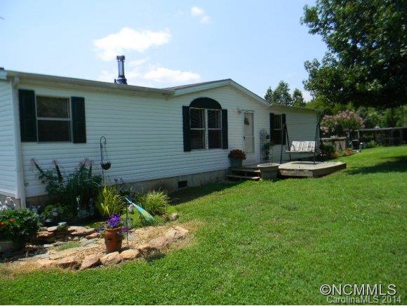 592 Scoggins Road Rutherfordton, NC 28139 - Photo 1 of 22 a front view of house with yard and outdoor seating