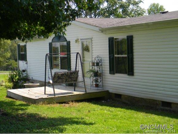 592 Scoggins Road Rutherfordton, NC 28139 - Photo 2 of 22 a view of a house with backyard