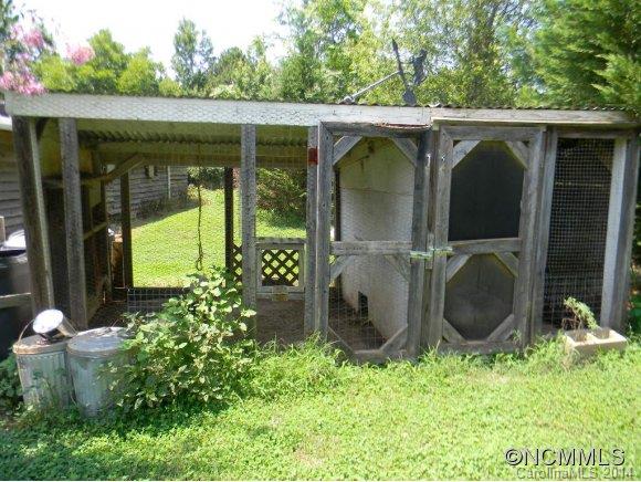 592 Scoggins Road Rutherfordton, NC 28139 - Photo 22 of 22 a backyard of a house with seating space