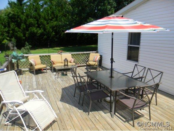 592 Scoggins Road Rutherfordton, NC 28139 - Photo 4 of 22 a patio with table and chairs