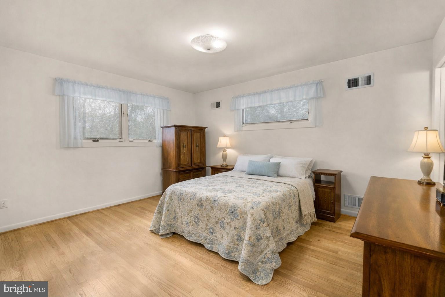 3905 Harrison Road Beltsville, MD 20705 - Photo 13 of 36 Primary bedroom with modern on suite