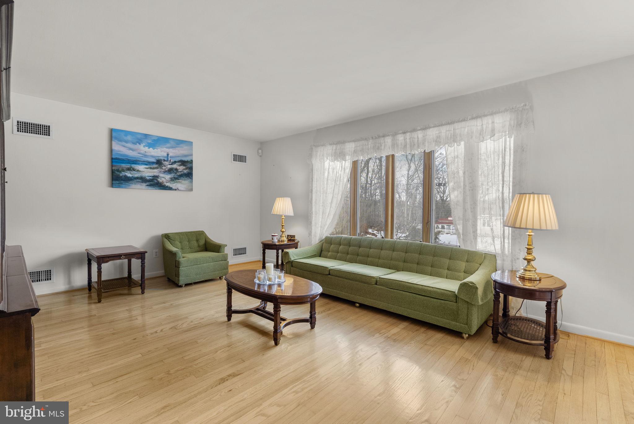 3905 Harrison Road Beltsville, MD 20705 - Photo 8 of 36 Spacious living room w/hardwood floors