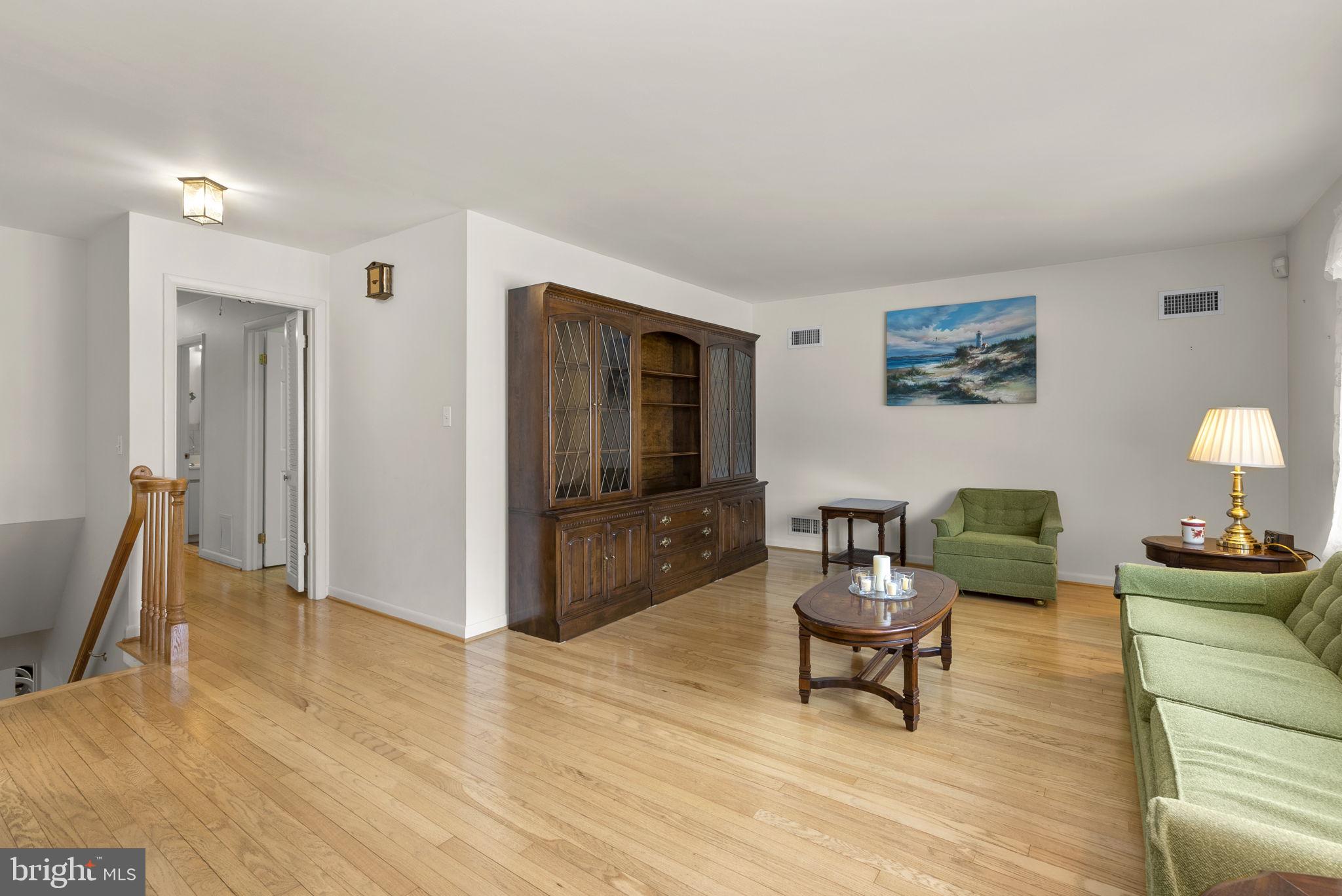 3905 Harrison Road Beltsville, MD 20705 - Photo 9 of 36 Spacious living room w/hardwood floors