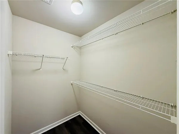 a view of a room with racks on the wall