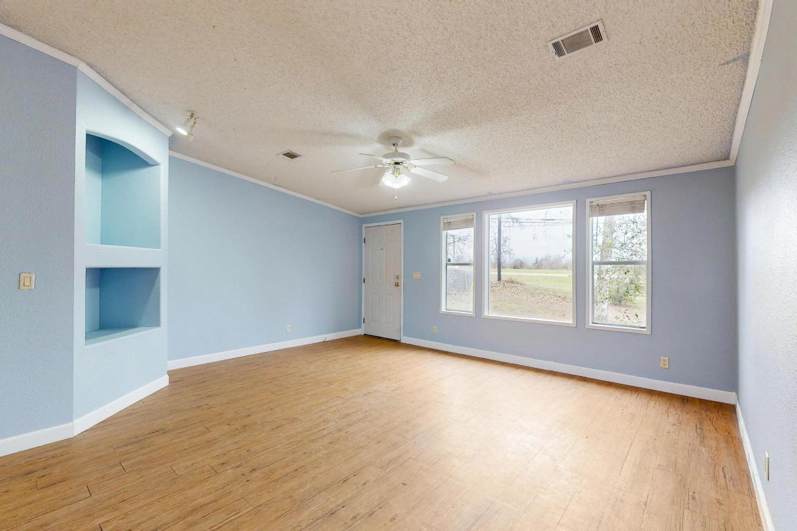 262 Highway 290 Highway East Elgin, TX 78621 - Photo 11 of 37 a view of an empty room with a window