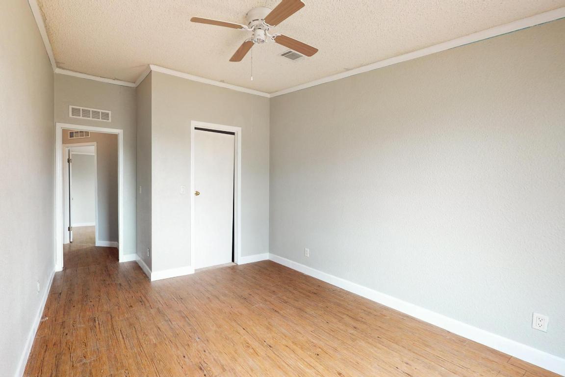 262 Highway 290 Highway East Elgin, TX 78621 - Photo 20 of 37 a view of empty room with wooden floor