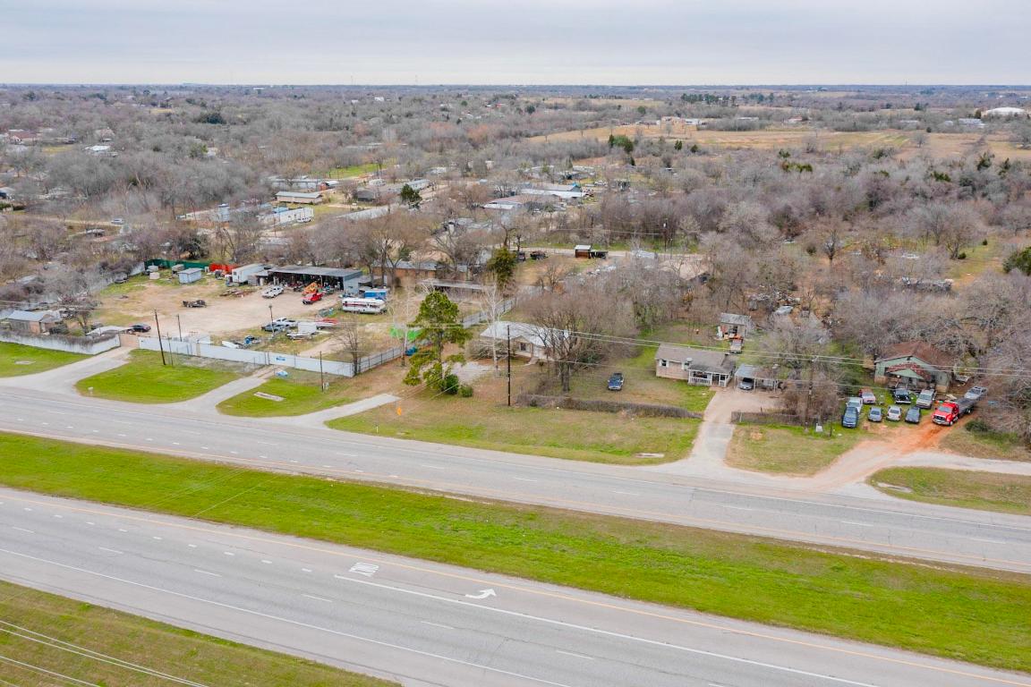 262 Highway 290 Highway East Elgin, TX 78621 - Photo 28 of 37 an aerial view of residential houses with outdoor space