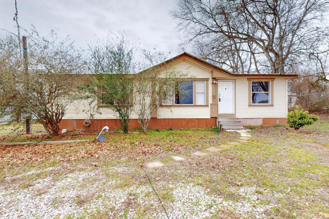 262 Highway 290 Highway East Elgin, TX 78621 - Photo 3 of 37 a view of a house with a yard