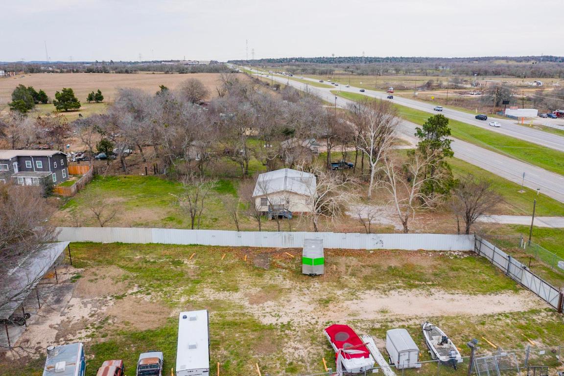 262 Highway 290 Highway East Elgin, TX 78621 - Photo 31 of 37 an aerial view of residential houses with outdoor space and swimming pool