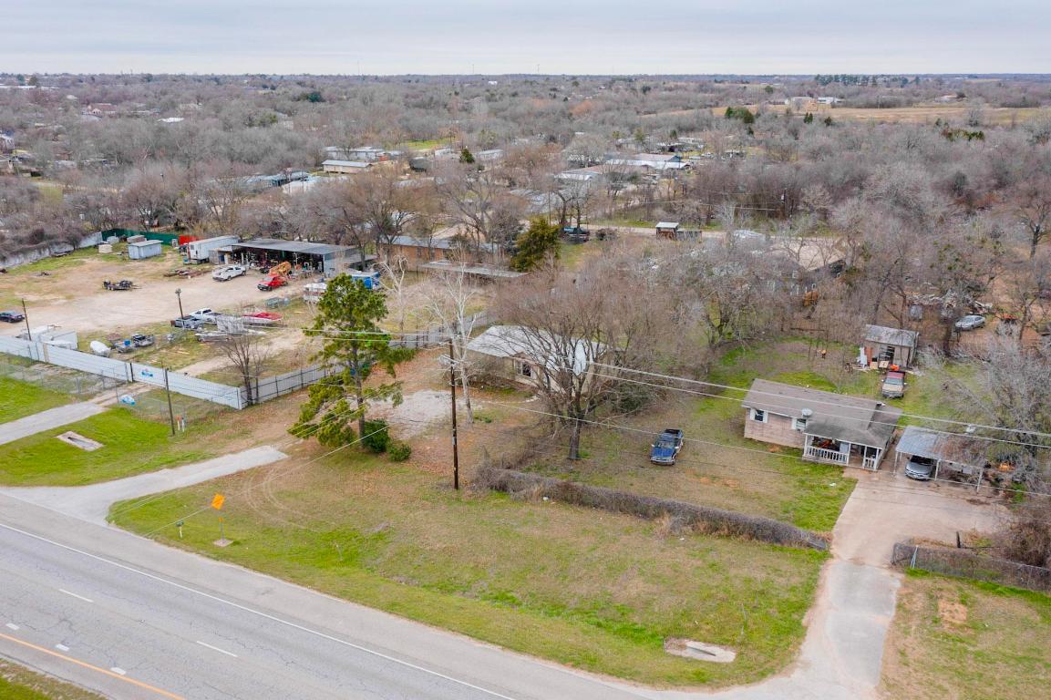 262 Highway 290 Highway East Elgin, TX 78621 - Photo 37 of 37 an aerial view of a house with a swimming pool and outdoor seating