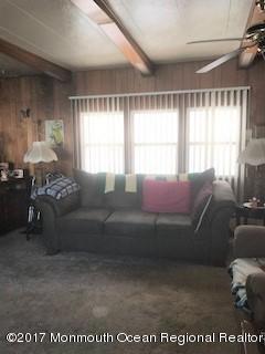 507 Roberts Road Toms River, NJ 08755 - Photo 8 of 19 a living room with furniture and a window