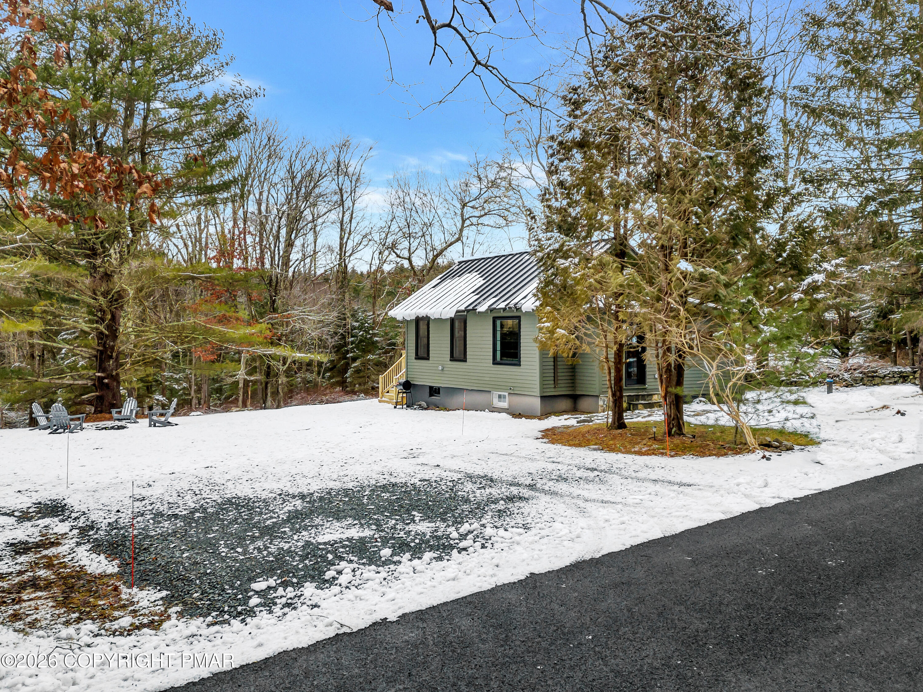 353 German Hill Road Shohola, PA 18458 - Photo 33 of 35 a view of a house with snow on the road