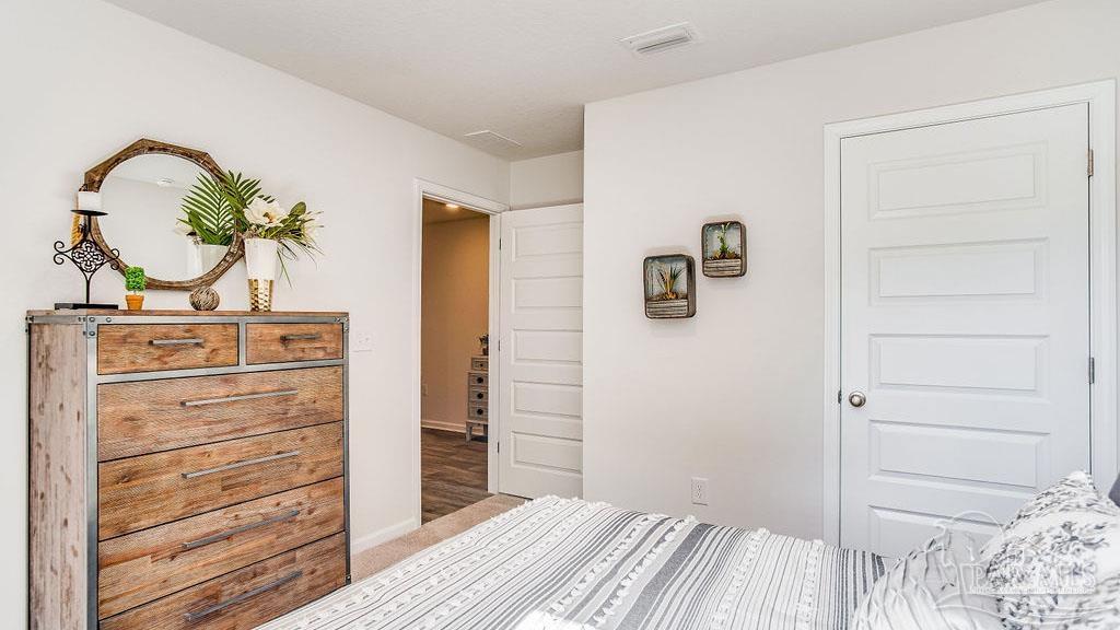 5078 Rainwater Road Milton, FL 32583 - Photo 20 of 26 a view of a dresser