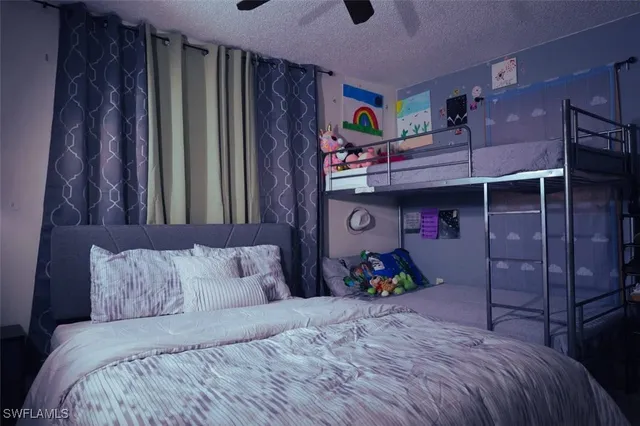 a bedroom with a bed and a closet