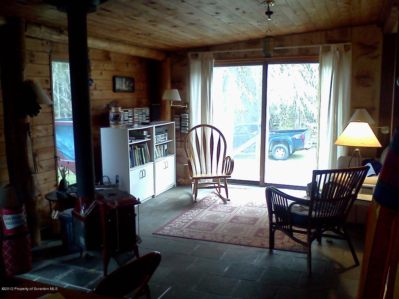1246 Franklin Road Kingsley, PA 18826 - Photo 6 of 14 a living room with furniture and a window