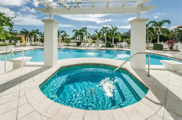 a view of a swimming pool with a patio