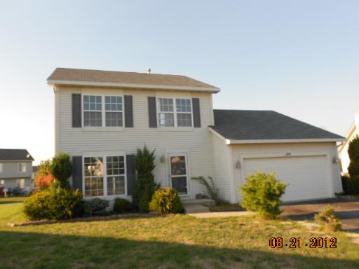 109 Fayette Court Minooka, IL 60447 - Photo 1 of 9 a front view of house with yard