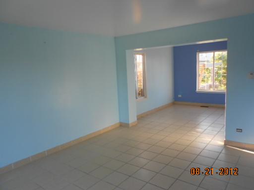 109 Fayette Court Minooka, IL 60447 - Photo 3 of 9 an empty room with windows