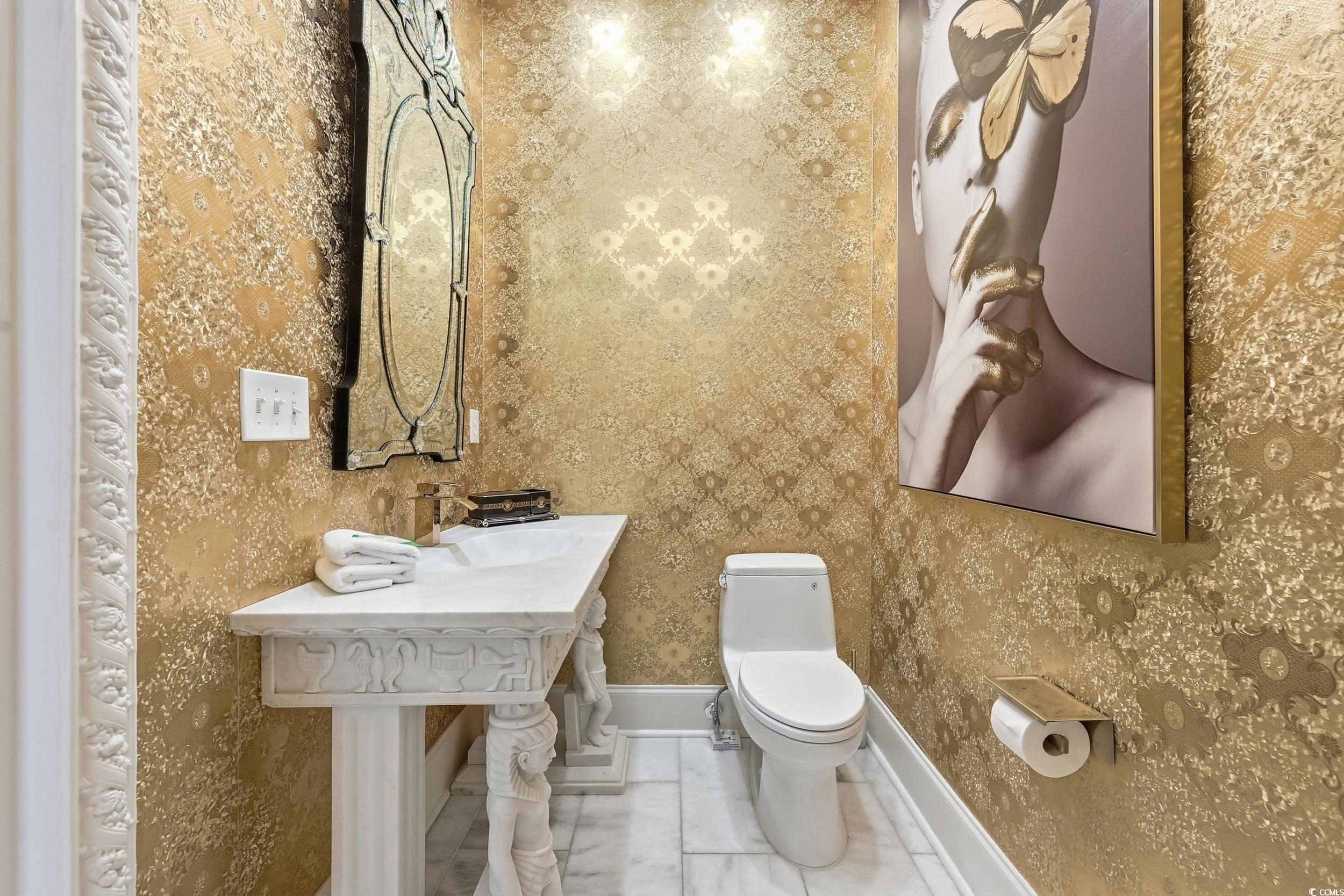 123 Pioneer Loop Georgetown, SC 29440 - Photo 12 of 40 Bathroom featuring wallpapered walls and toilet