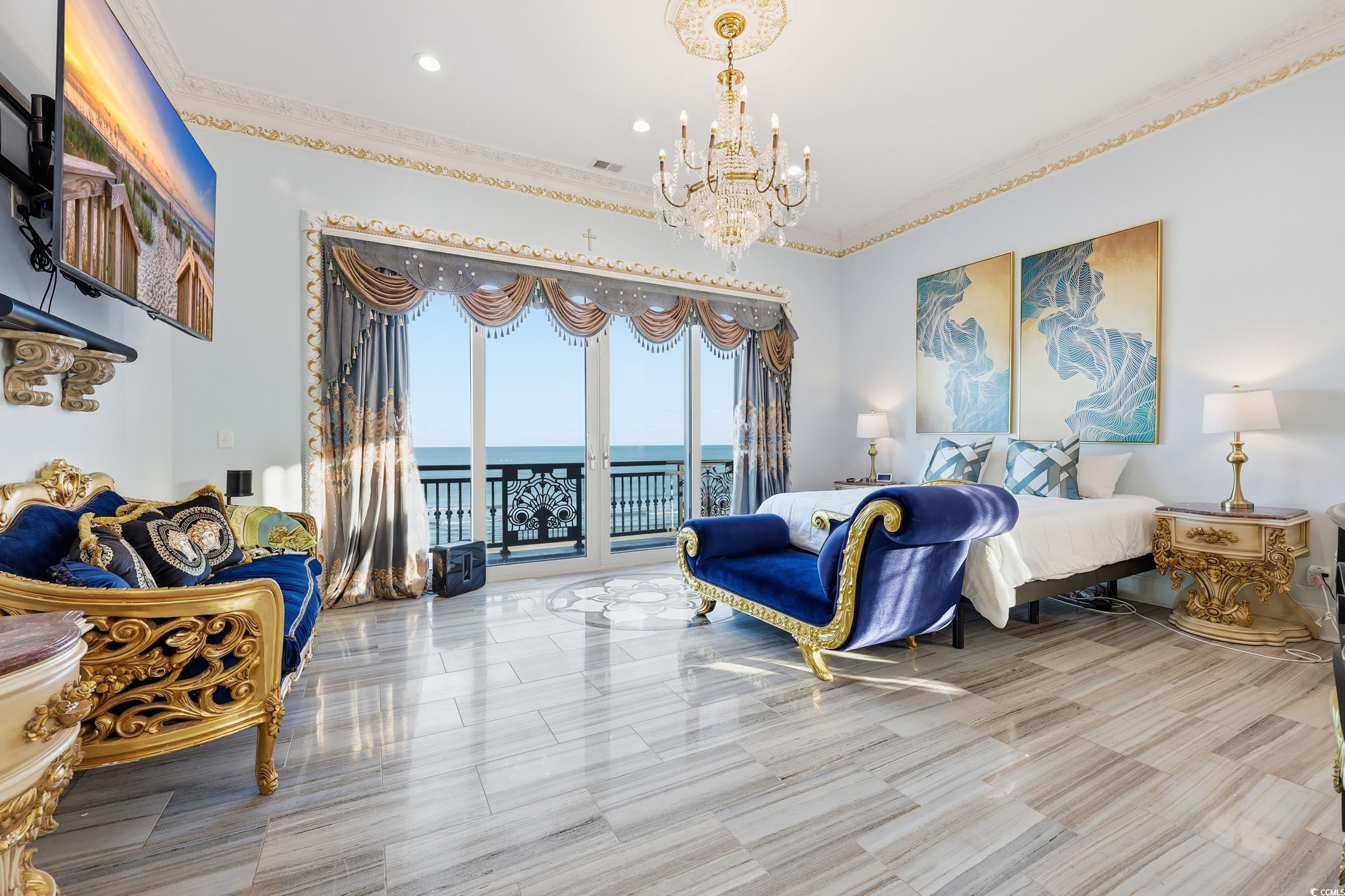 123 Pioneer Loop Georgetown, SC 29440 - Photo 30 of 40 Bedroom featuring crown molding, a chandelier, and access to outside