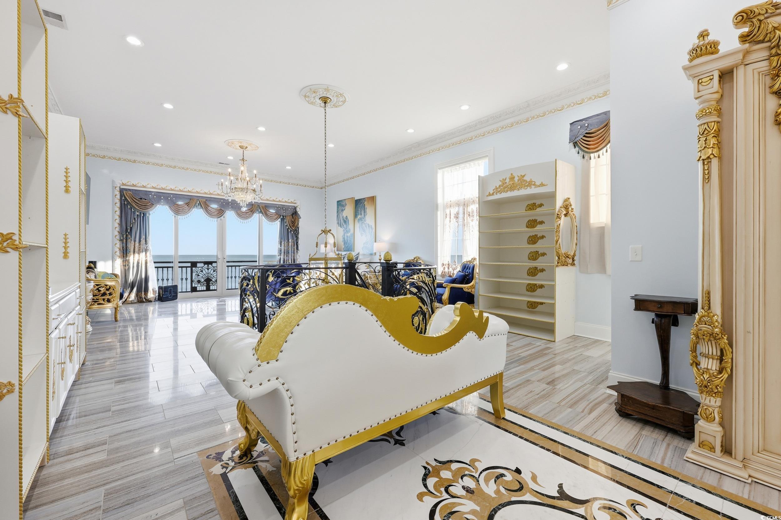 123 Pioneer Loop Georgetown, SC 29440 - Photo 31 of 40 Dining area with ornamental molding, light wood finished floors, a chandelier, and recessed lighting