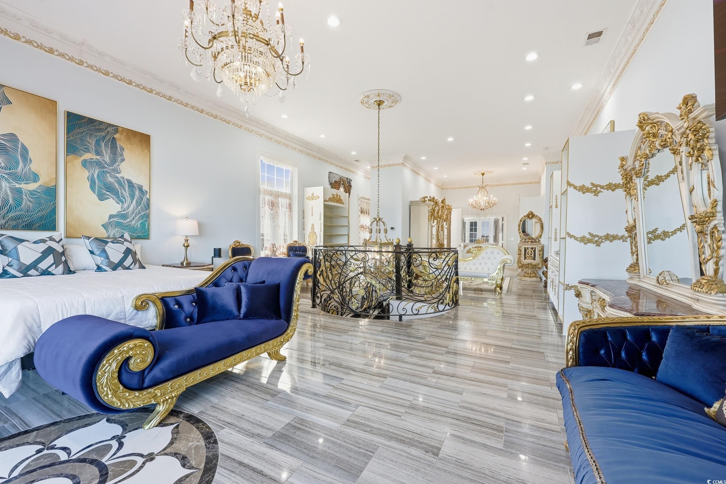 123 Pioneer Loop Georgetown, SC 29440 - Photo 32 of 40 Living area with a chandelier, crown molding, and recessed lighting