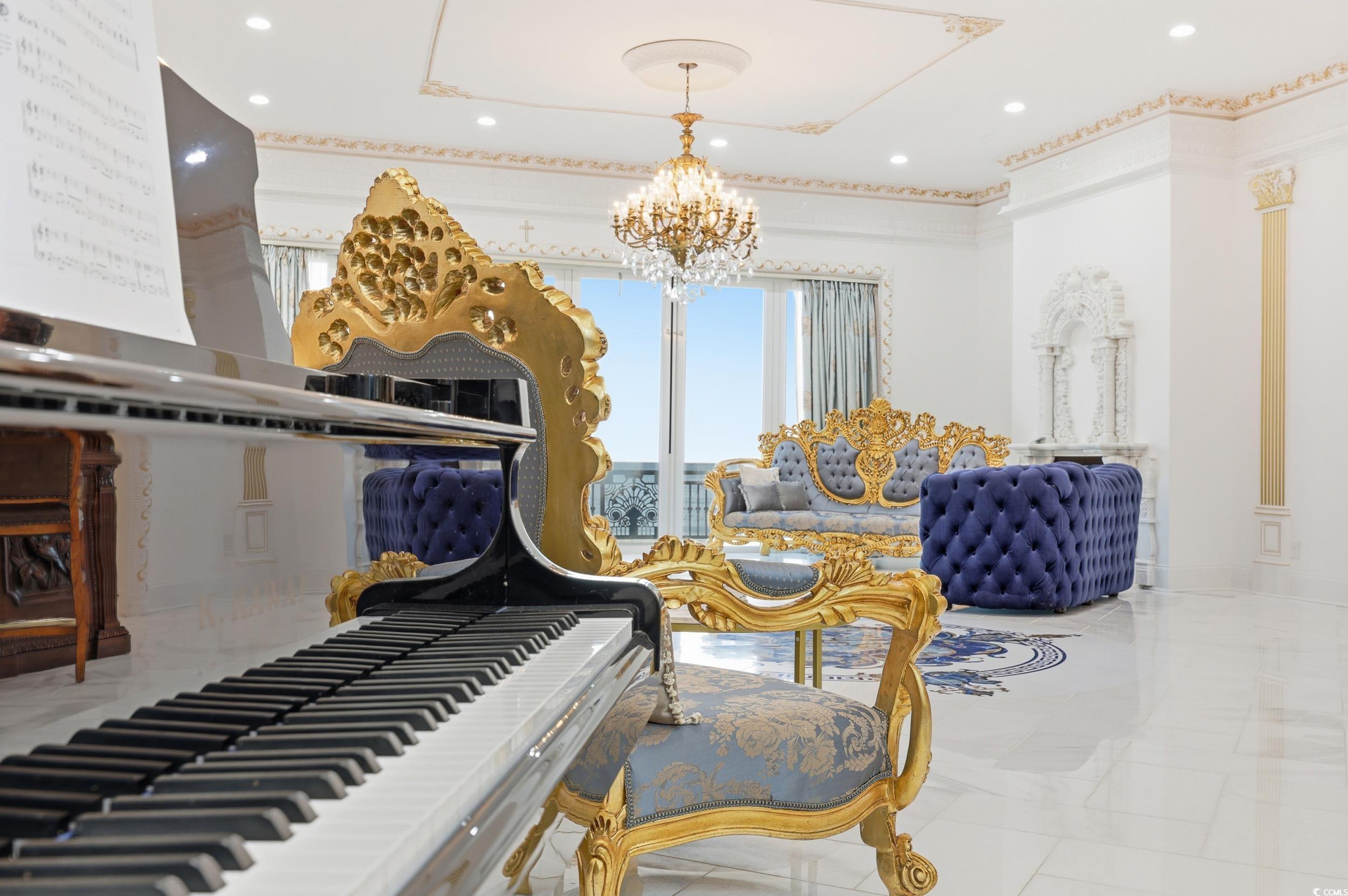 123 Pioneer Loop Georgetown, SC 29440 - Photo 9 of 40 Living area with a chandelier and recessed lighting