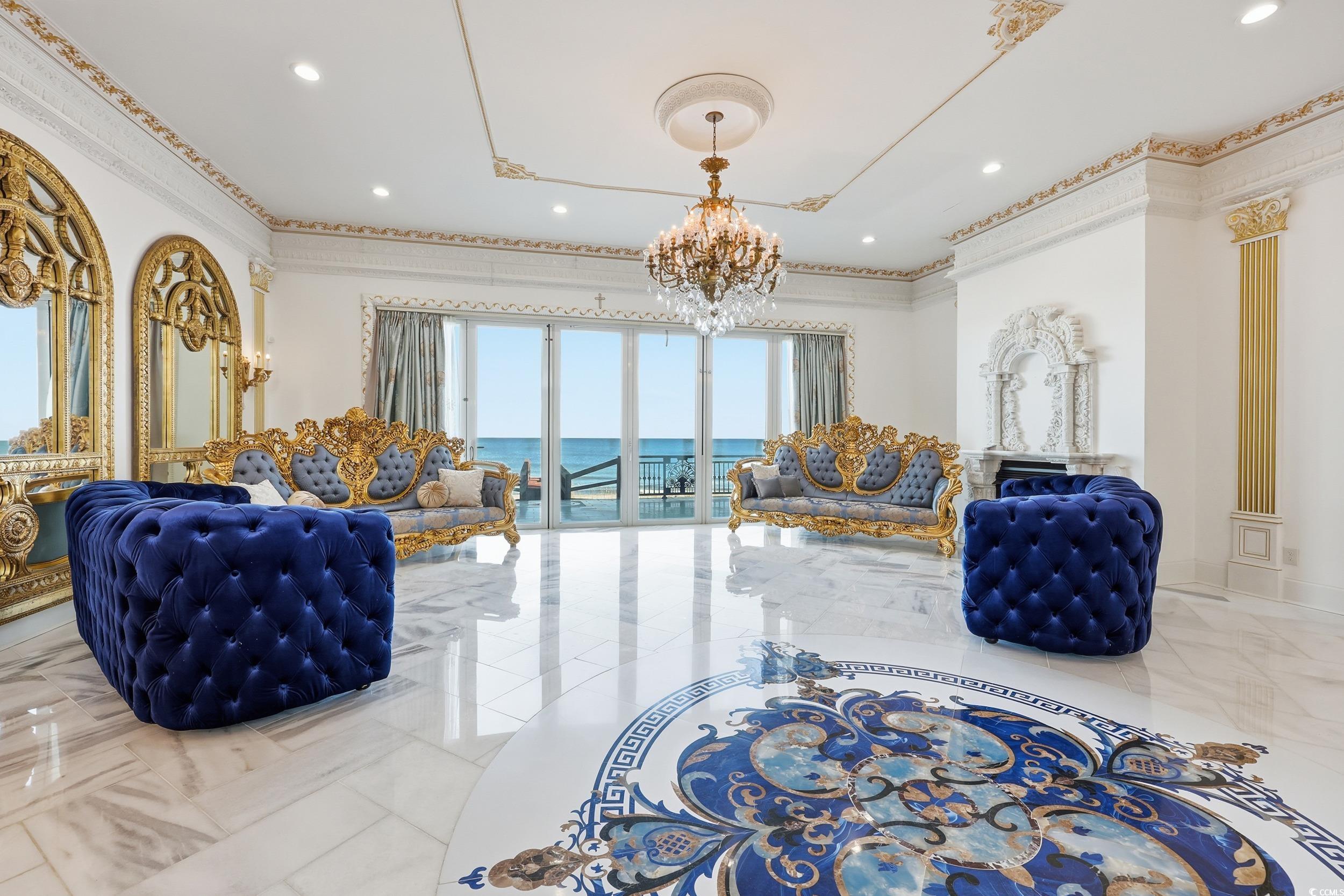 123 Pioneer Loop Georgetown, SC 29440 - Photo 10 of 40 Living room featuring crown molding, a chandelier, and recessed lighting
