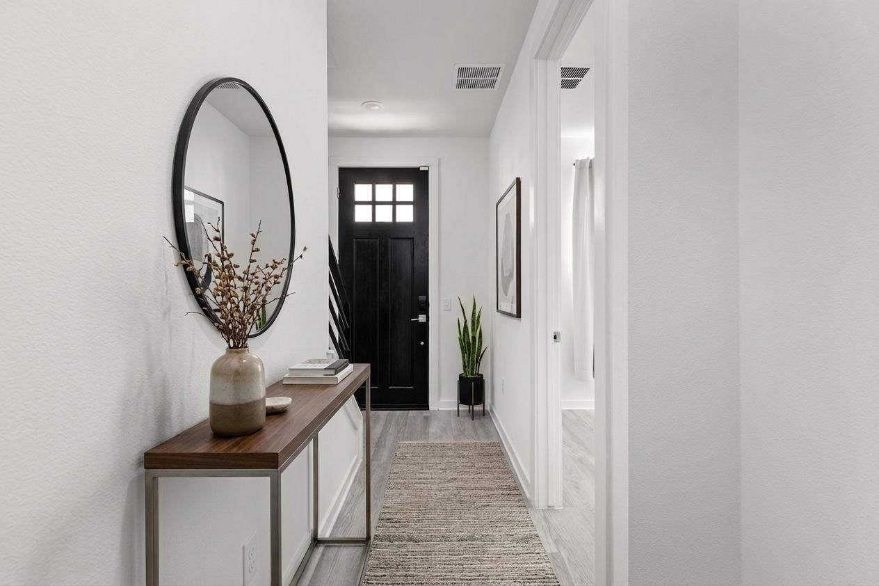 2624 Metcalfe Road, Unit 17 Austin, TX 78741 - Photo 3 of 35 a view of a hallway with front door