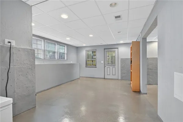 an empty room with windows