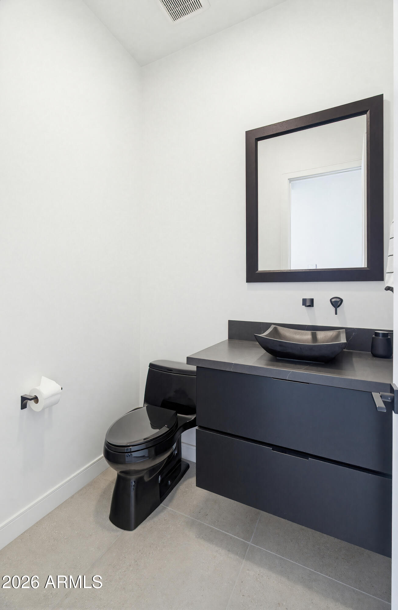 3350 East Highline Canal Road Phoenix, AZ 85042 - Photo 103 of 105 a bathroom with a toilet and a sink
